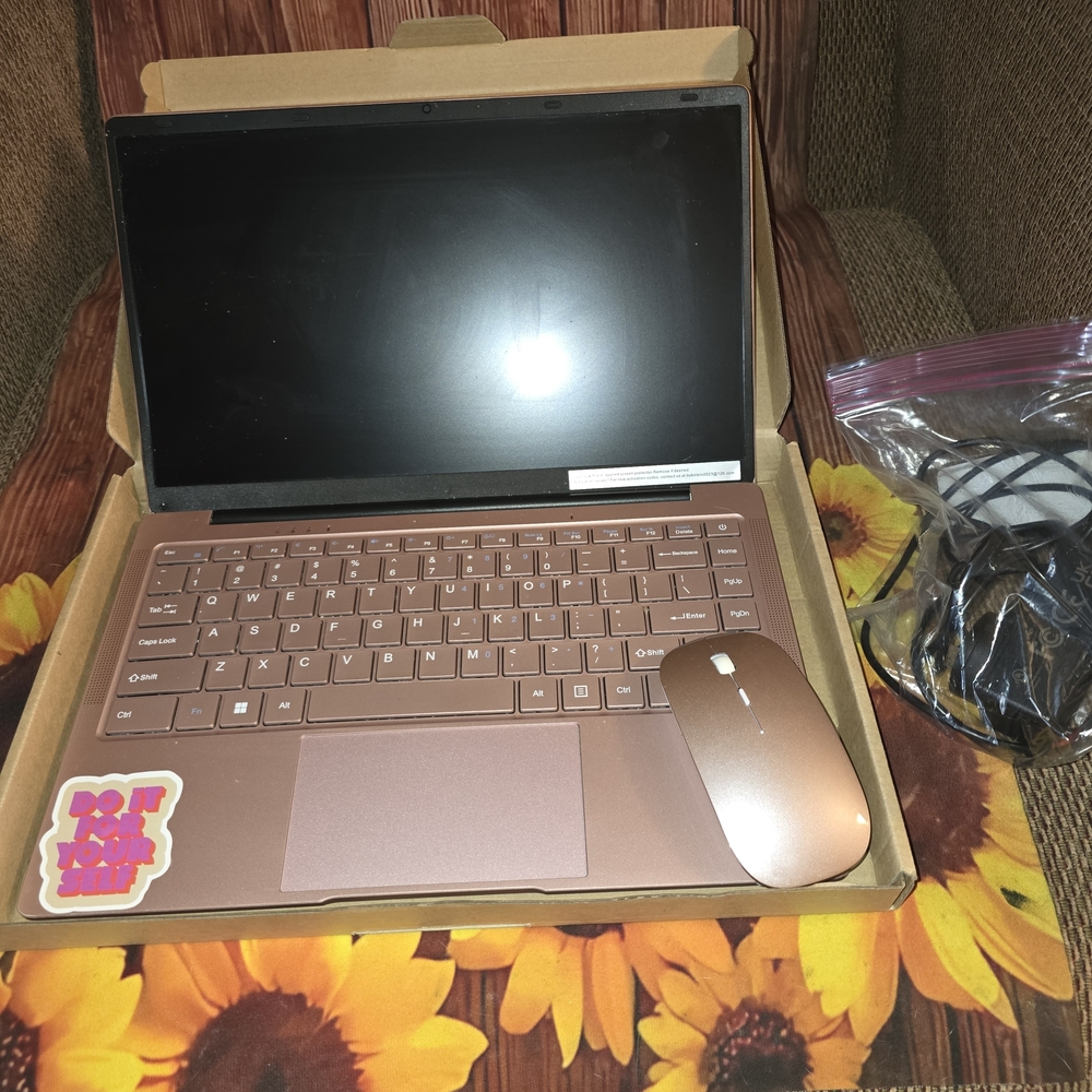 Rose Gold Laptop with Accessories